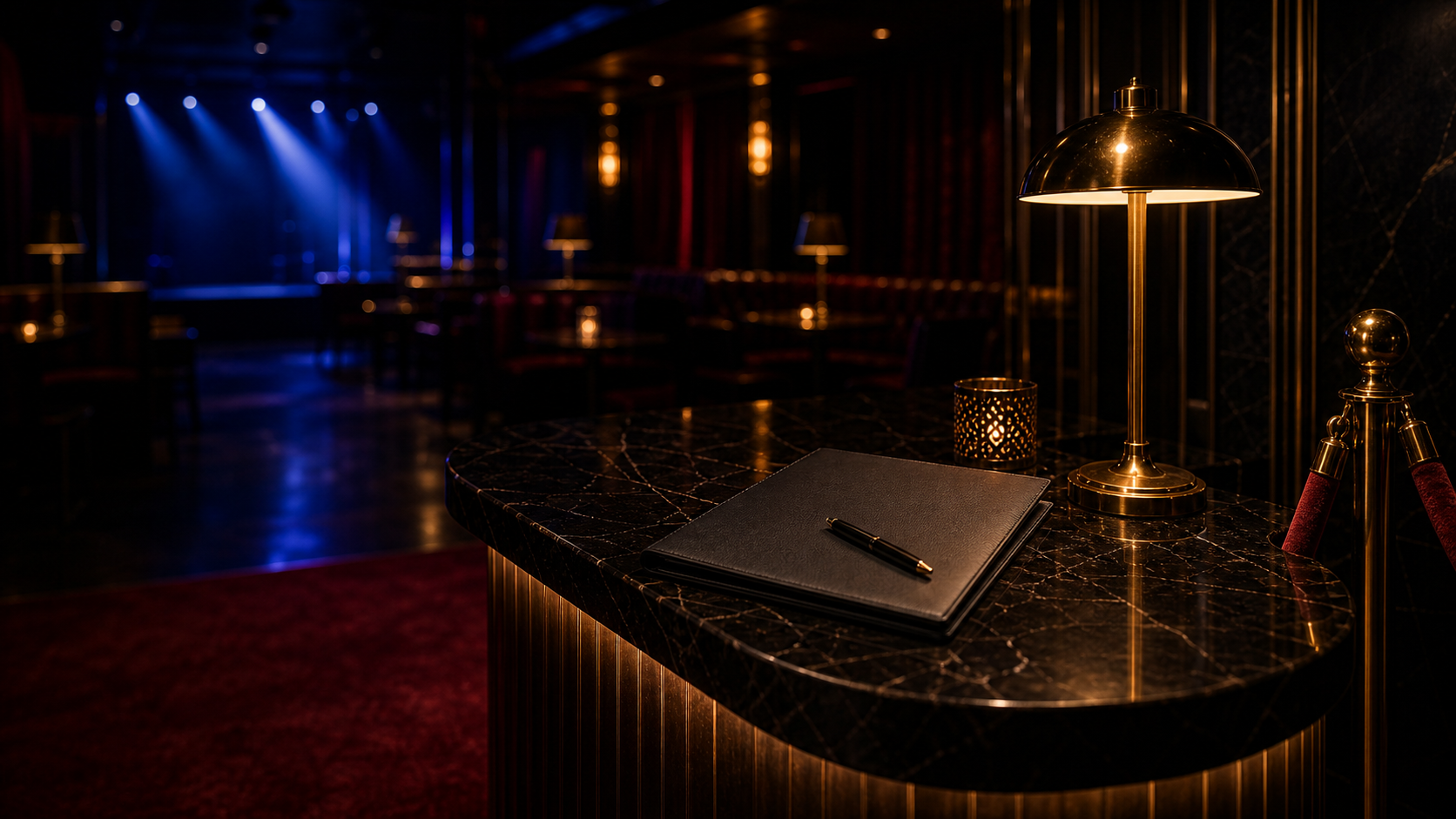 Premium venue reception desk with application folder and brass lamp